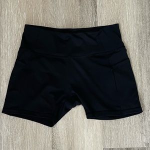 Never worn! Biker shorts with pockets. Size L